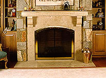 Private Residence, Chapel Hill. Fabricated in Germany to meet our design requirements, this fireplace is made of Sohlnhofen limestone. This particular job used sculpted cubes of stone for the supporting corbels and the mantle. The stone is a soft beige with light gray accents. It ranges