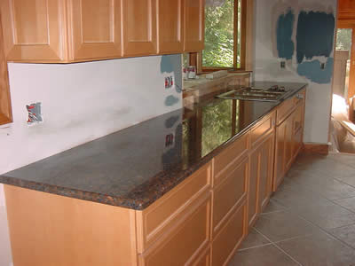 Private Residence, Raleigh. The owner of this North Raleigh residence selected Blue Caramel (AKA Amazon Blue) granite for her kitchen. Prescott Stones Factory Seam, as shown here, allows us to install counters up to 14 feet long without a site seam. Our Factory Seams minimize the